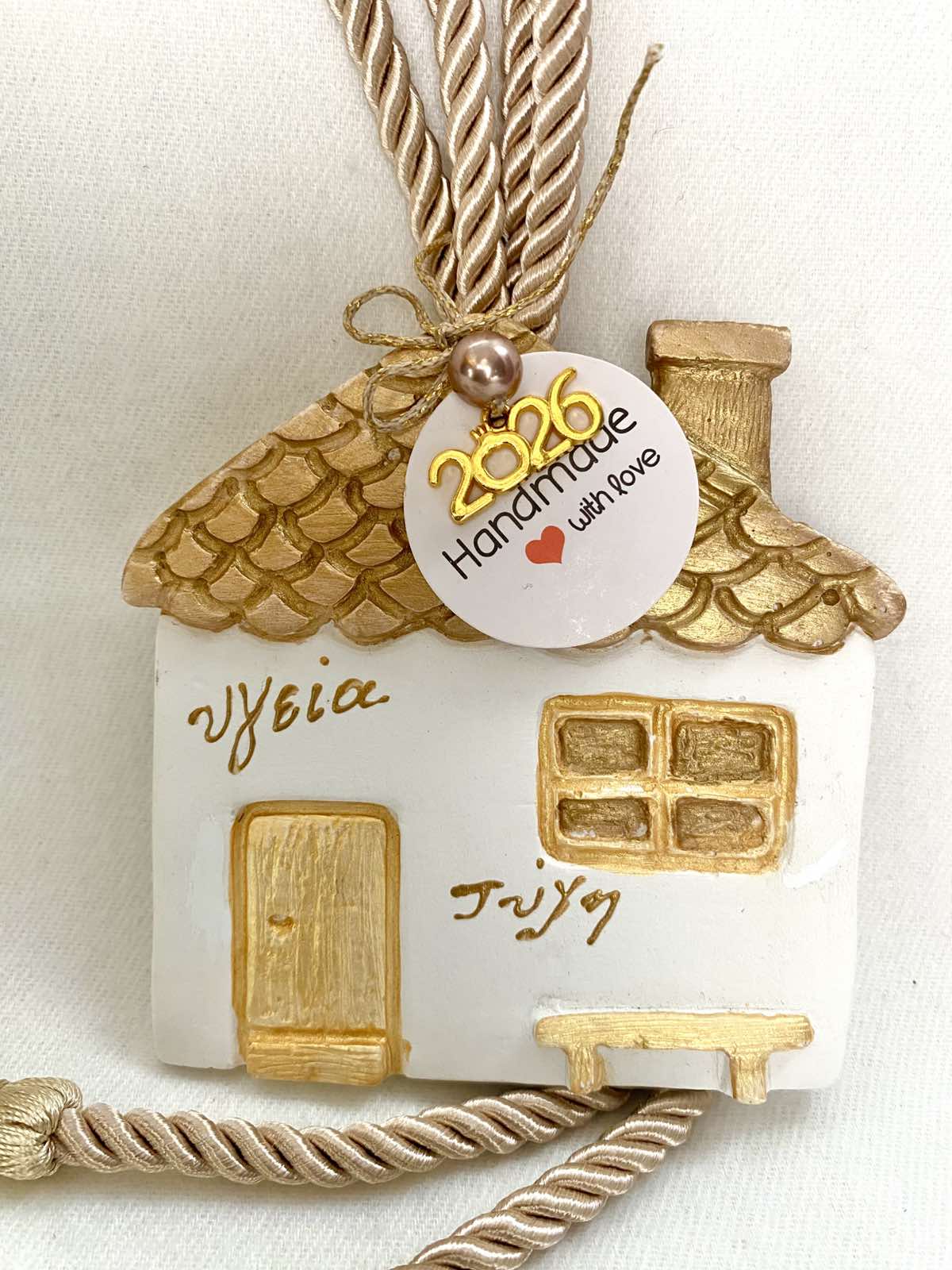 Γούρι σπιτάκι χρυσό.